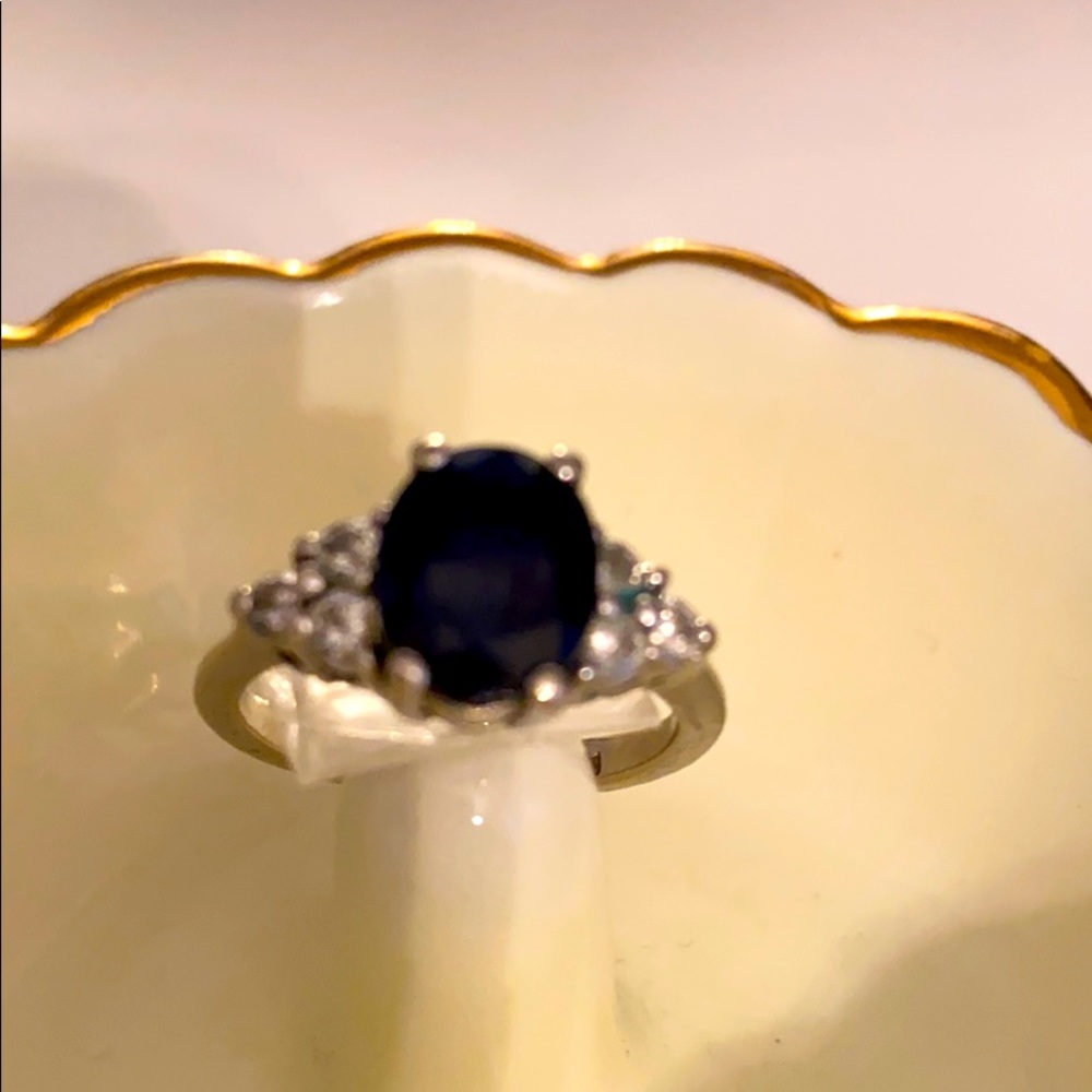 Sapphire and diamond ring on white gold band.